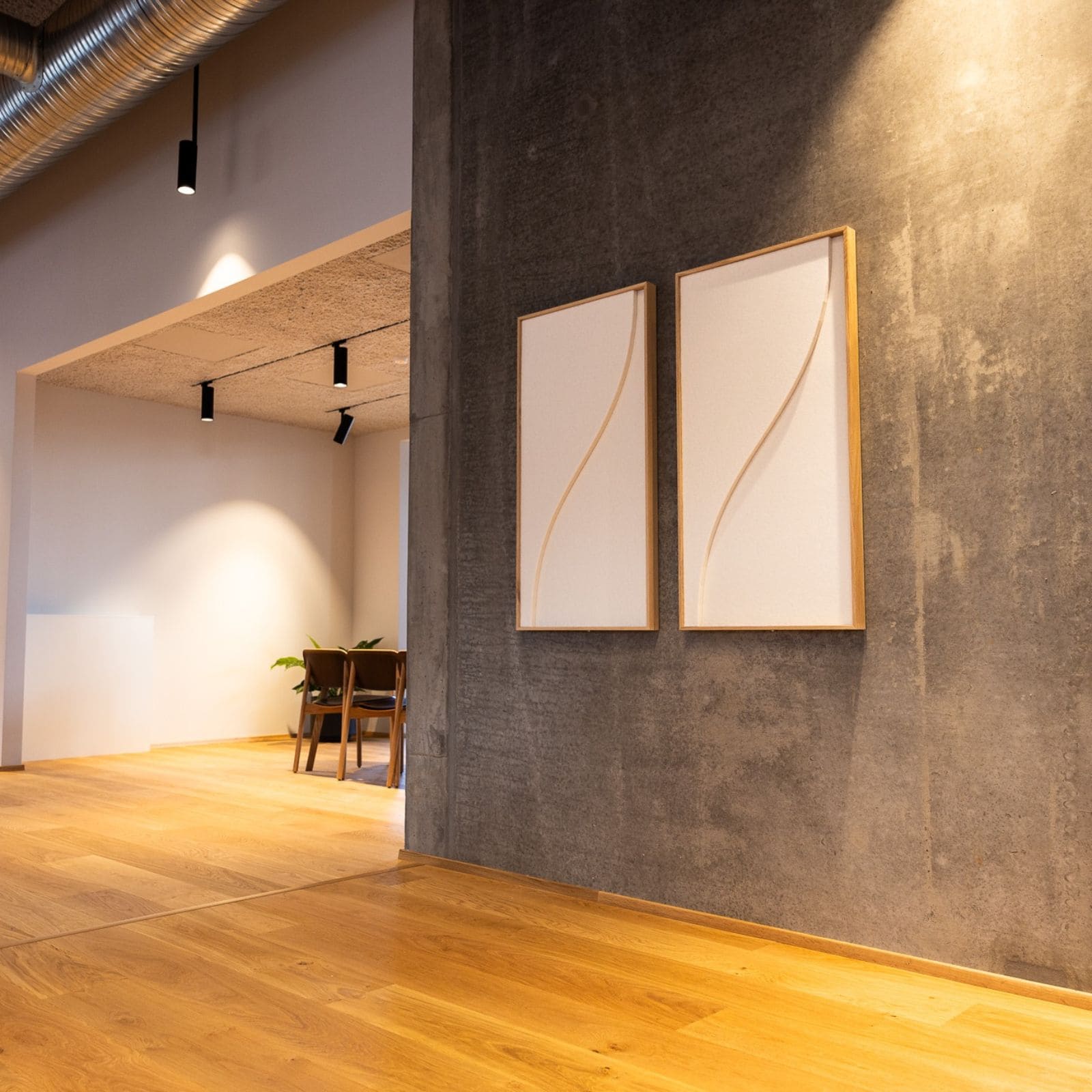 Decorative soundproofing wall panels in a minimalist interior, blending acoustic function with modern architectural design.